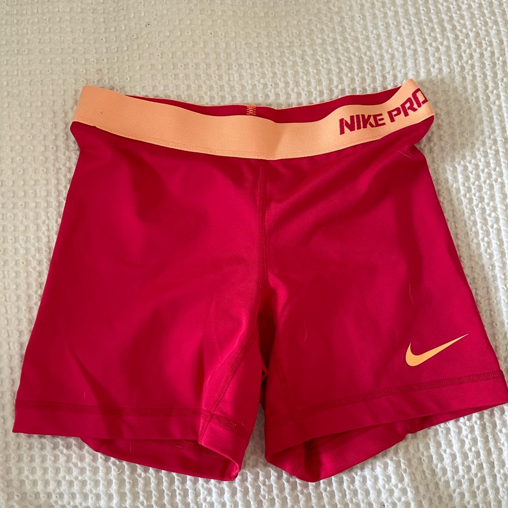 Hot pink Nike pro spandex shorts